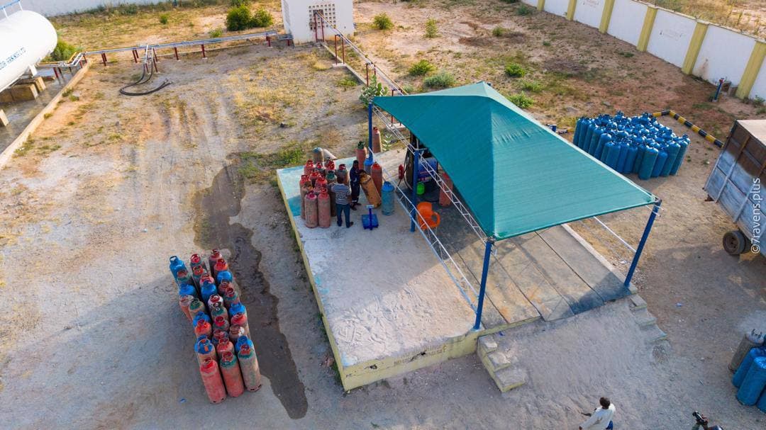 Aerial view of MS Raddah gas station with LPG cylinders